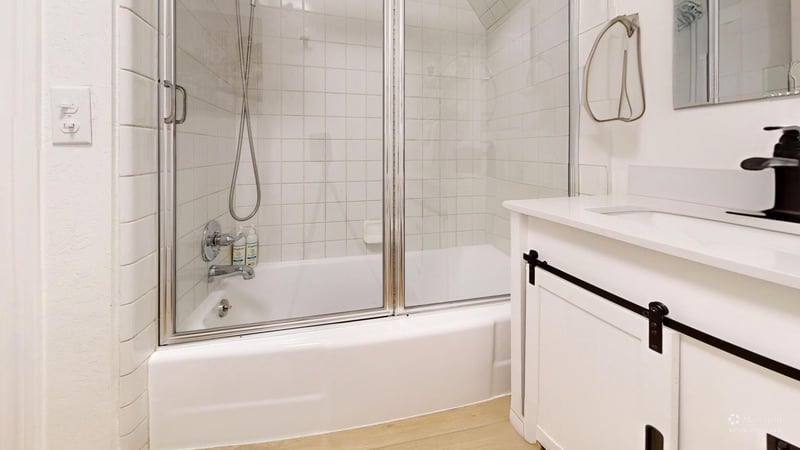 Located on the main level, full bathroom with showertub combination.