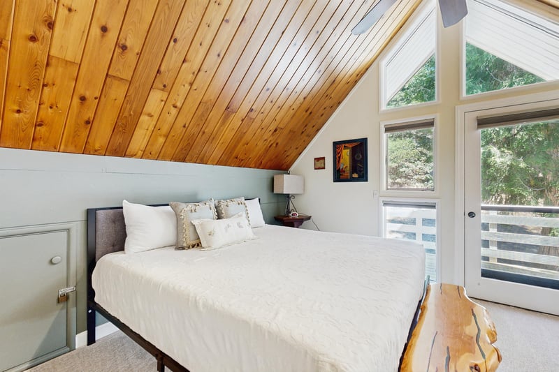 Located on the top level with a king size bed, private deck, and ensuite bathroom.