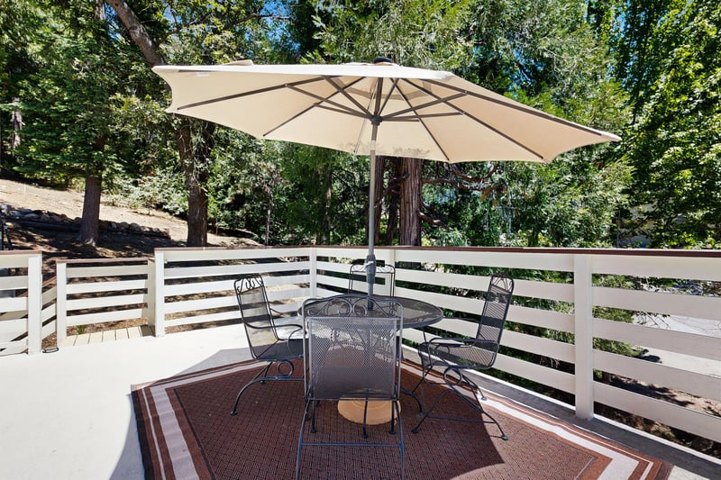Side deck with additional outdoor dining.
