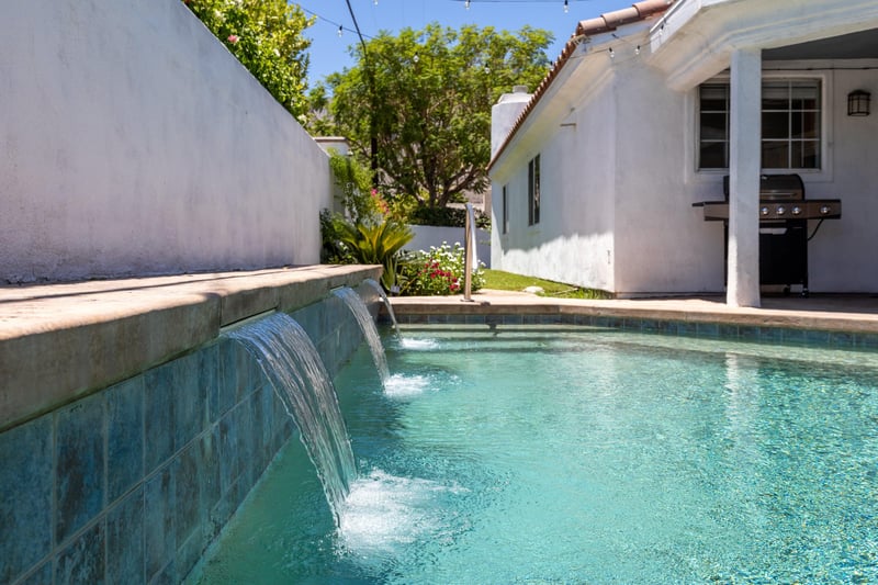 Private pool with fountains.