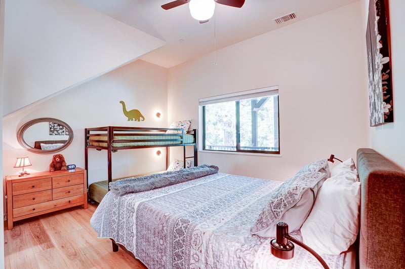 Queen size bed and twin over twin bunk bed.