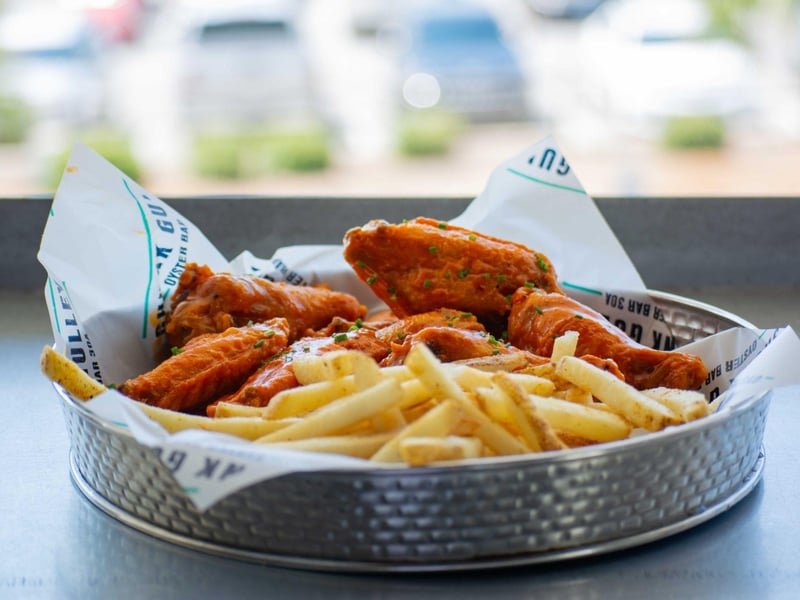 Crispy wings with fries in Santa Rosa Beach, Florida