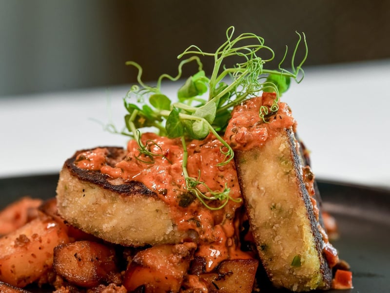 Crab cakes with Spanish bravas