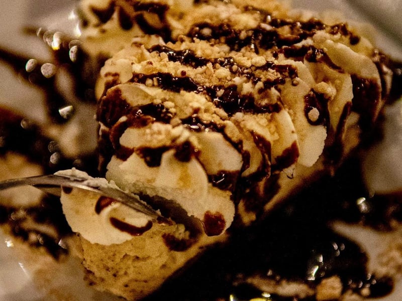 Peanut butter cream pie with chocolate sauce
