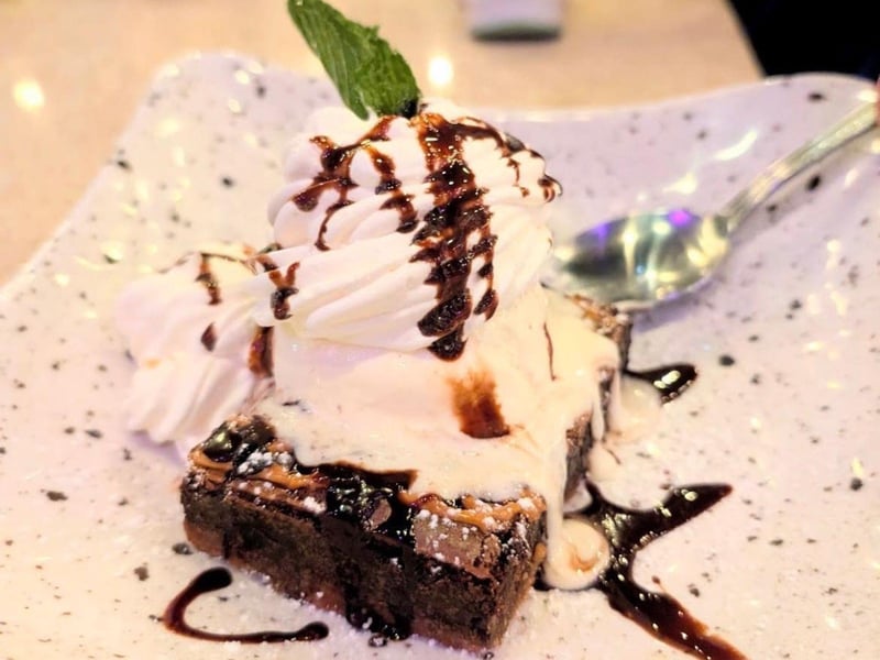 Salted caramel brownie with vanilla ice cream