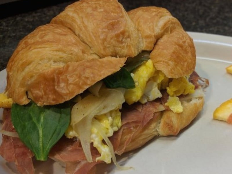 A breakfast croissant at Capriccio Cafe