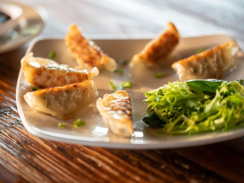 Pot stickers with a spicy soy vinaigrette