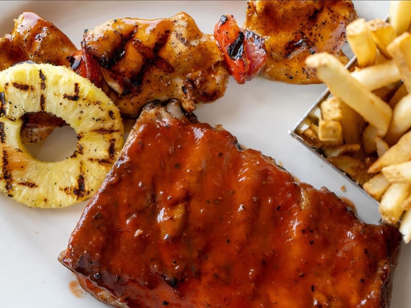 Southernstyle barbecue ribs with shrimp shish kabobs