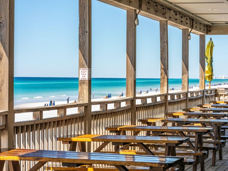 Beachside dining at The Whales Tail Beach Bar  Grill