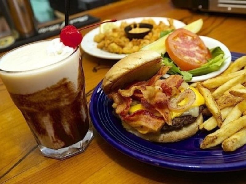 A bushwacker and bacon cheeseburger