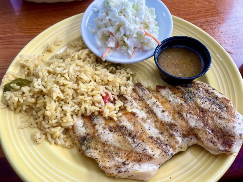 Grilled chicken with yellow rice and coleslaw