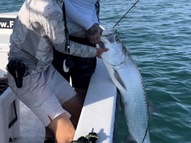 Anglers fishing off the coast of Holmes Beach, Florida