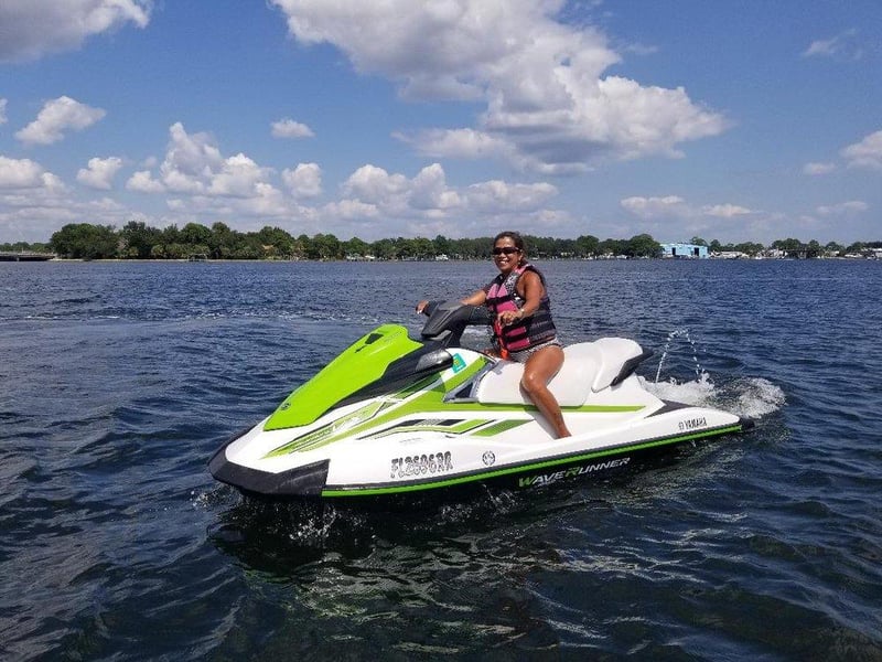 Woman riding jet ski on open water in Fort Walton Beach Florida