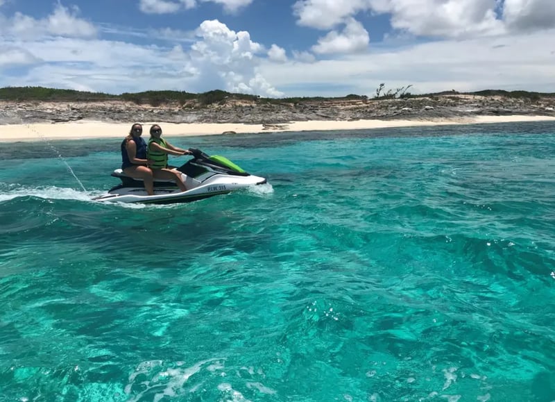 Jet Ski riders enjoy turqoise water in Choctawhatchee Bay