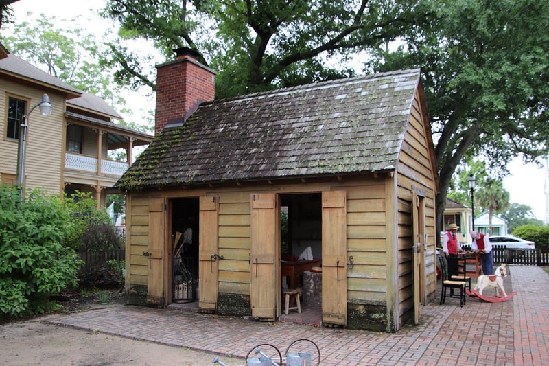 Historic wooden building at Historic Pensacola Village with traditional architecture