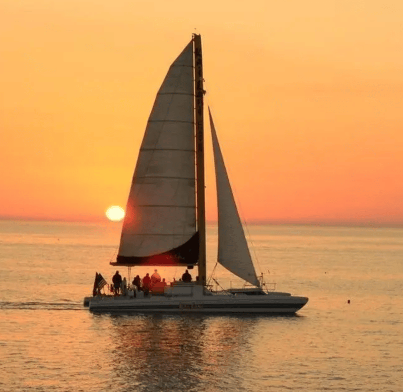 Experience a stunning sunset during the relaxing cruise