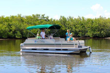 Guests relaxing aboard the Yamaha 150hp pontoon.
