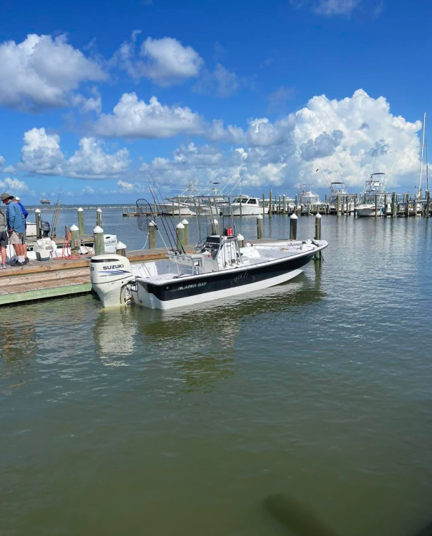 Captain Gallaghers 2400 Blazer Bay in the water