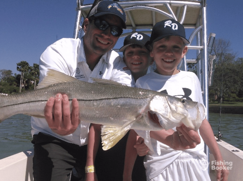 Book a family fishing trip with Bait House Charters