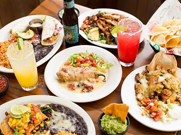A spread of dishes and drinks at La Paz