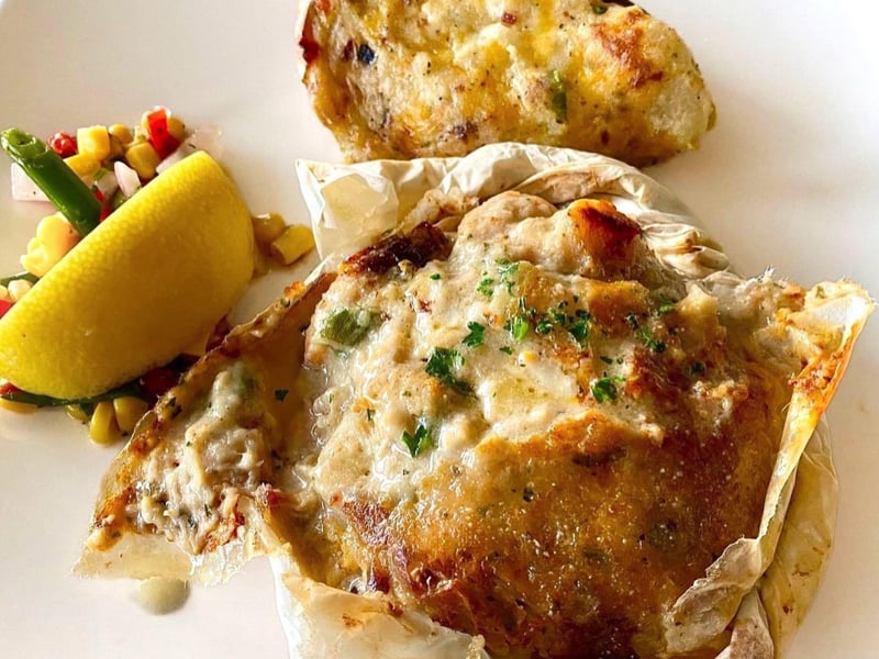 Snapper en Papillotte with a beurre blanc sauce