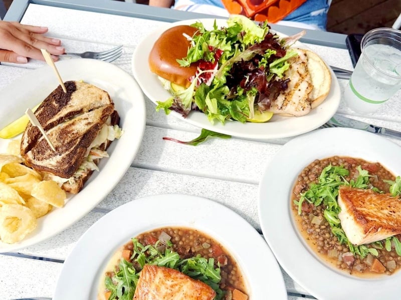 A variety of dishes on a table from Bud and Alleys Restaurant