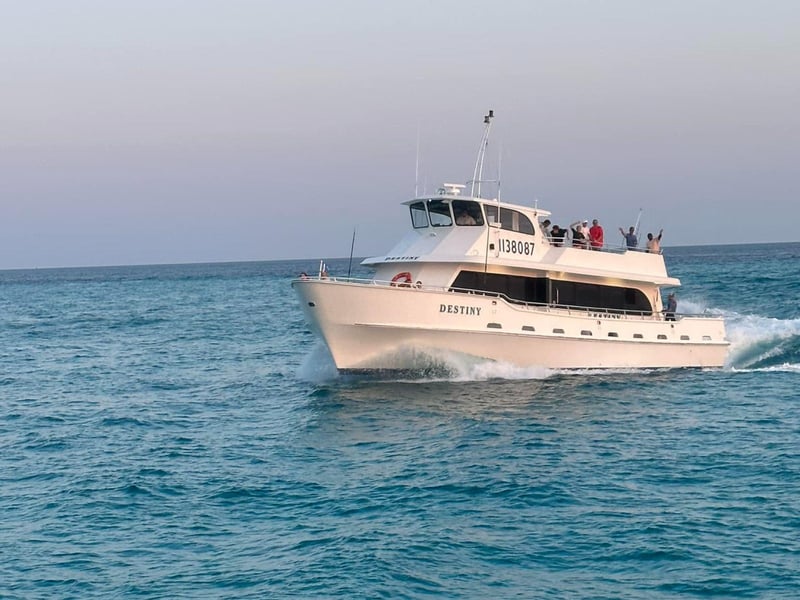Destiny fishing charter and party boat on the water off the coast of Destin, Florida