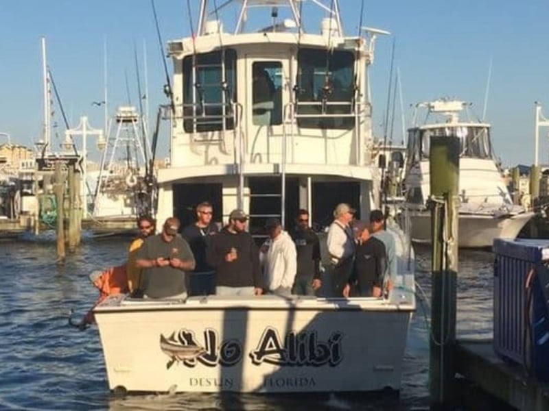 A group on No Alibi at the dock in Destin, Florida