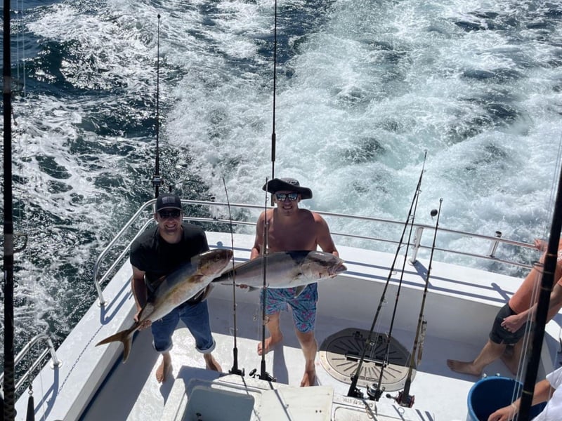 Two men on Rip Tide with their catch in Orange Beach, Alabama
