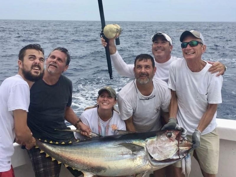 A group showing off their catch on Summer Breeze