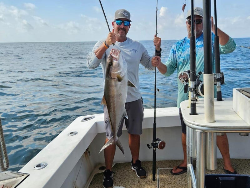 Two men with their catch on board Summer Hunter