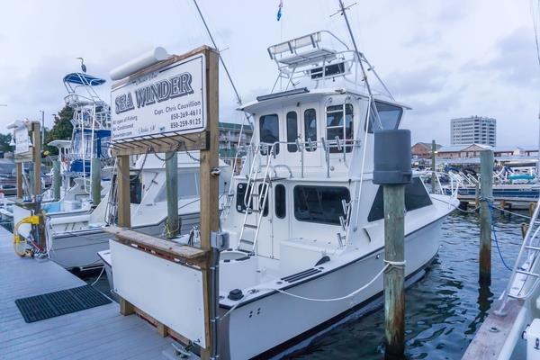 425330 Charter Boat Sea Winder At The Dock 