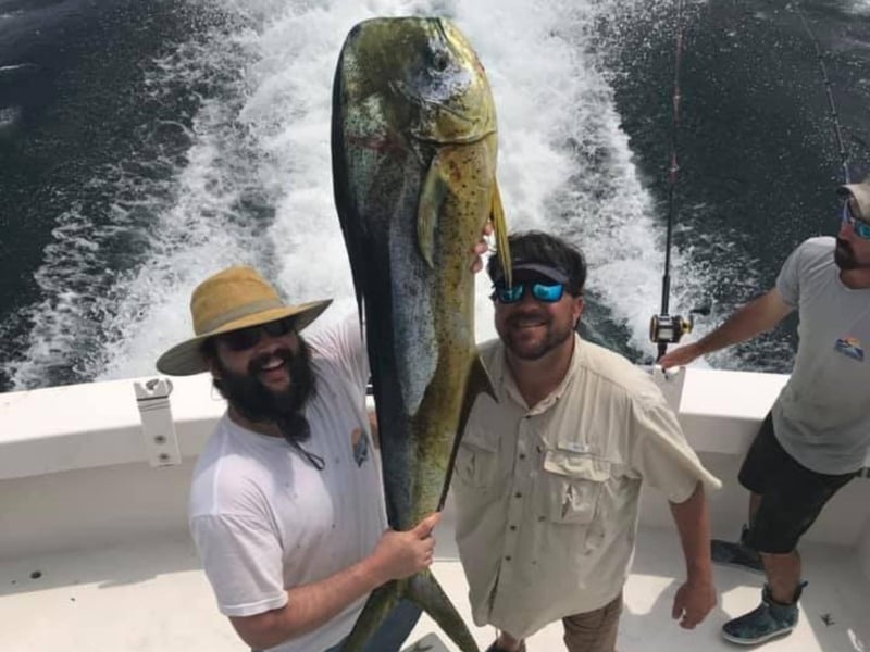 Two men with their catch on board Sea Winder in Destin, Florida