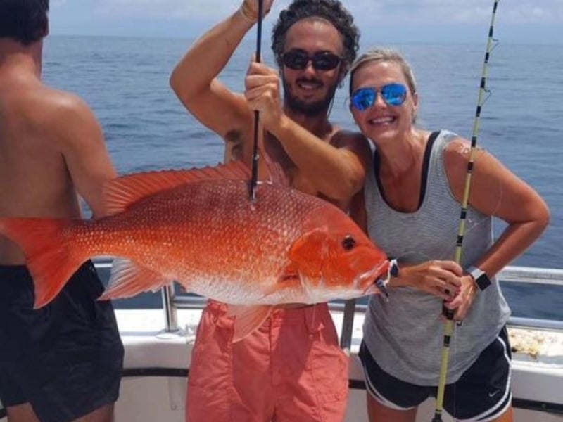 A couple with their catch on board Shady Lady Charters in Orange Beach, Alabama