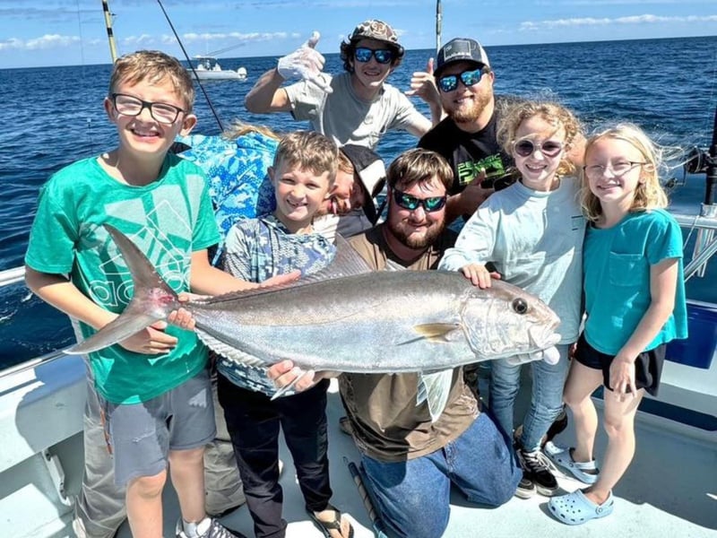 A family with their catch on board the Entertainer
