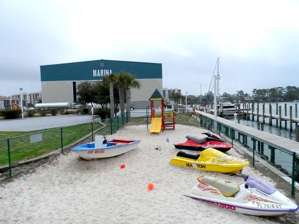 The Sunset Grille Marina playground with boats  jet skis to ride or climb on.