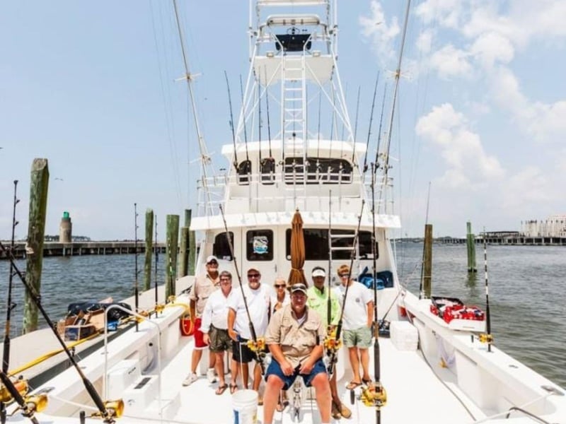A group with their rods on Annie Girl Charters in Orange Beach, Alabama