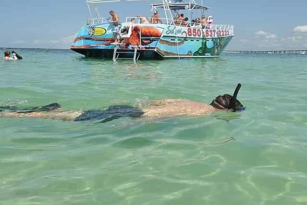 A kid snorkeling in Destin, Florida