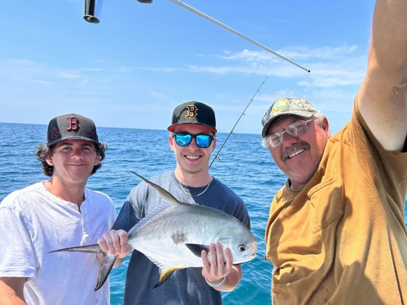 425769 Three Men With Their Catch On The Back Of A Boat With Rodbender Fishing Charters
