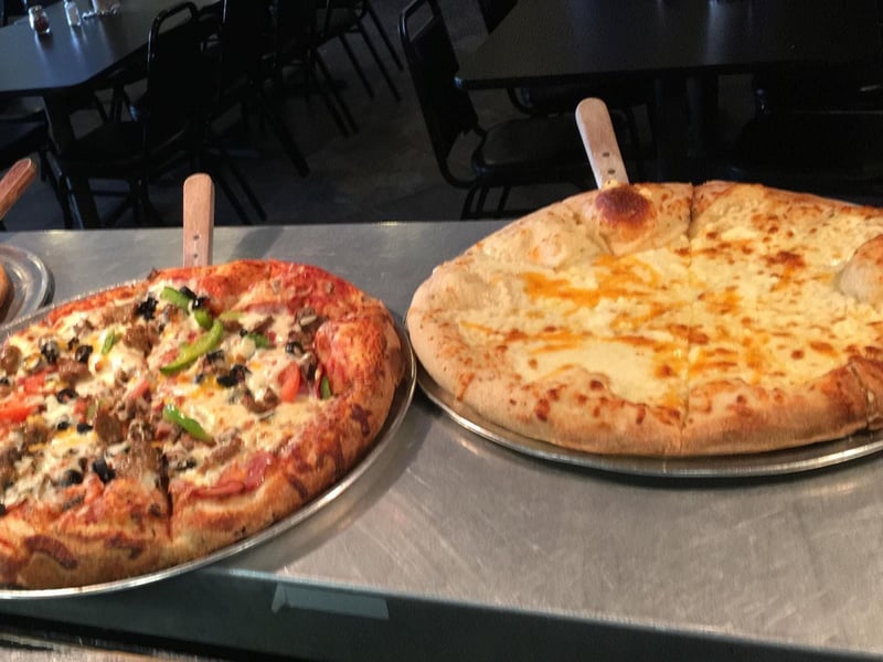 Two pizzas from Fat Daddys Pizza in Santa Rosa Beach, Florida