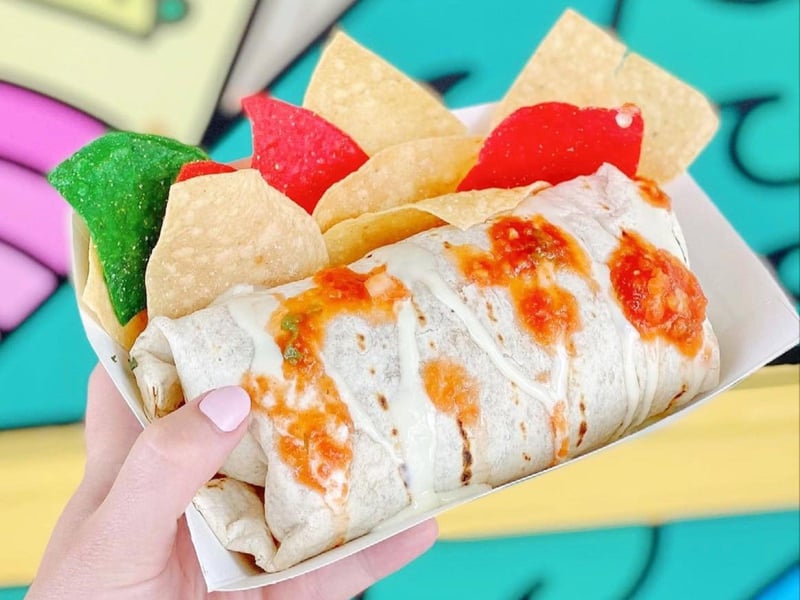 A burrito with chips from Bud  Alleys Taco Bar in Seaside, Florida