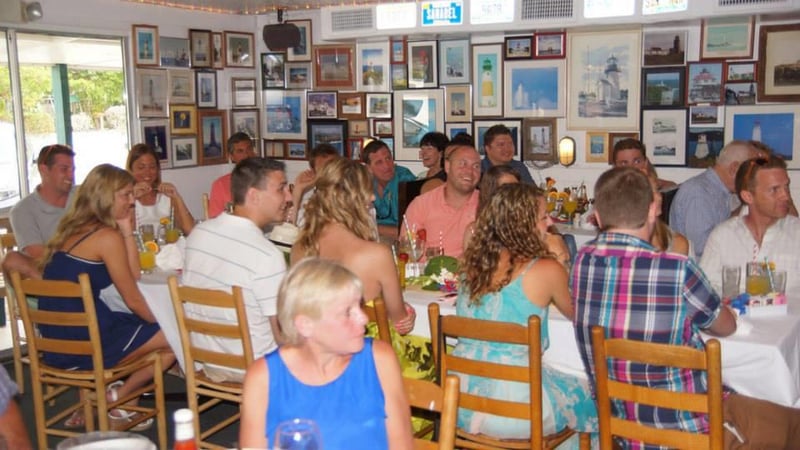 Group seated at table inside the Lighthouse Cafe on Sanibel Island