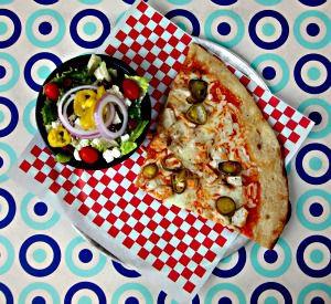 Pizza and a side salad at Pizza by the Sea on 30A