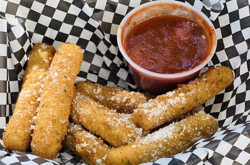 Mozzarella sticks with marinara sauce from Brunos Pizza