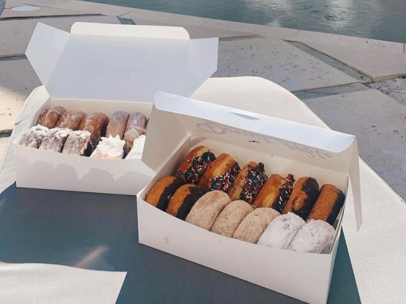 Boxes of donuts from the Donut Hole in Santa Rosa Beach, Florida