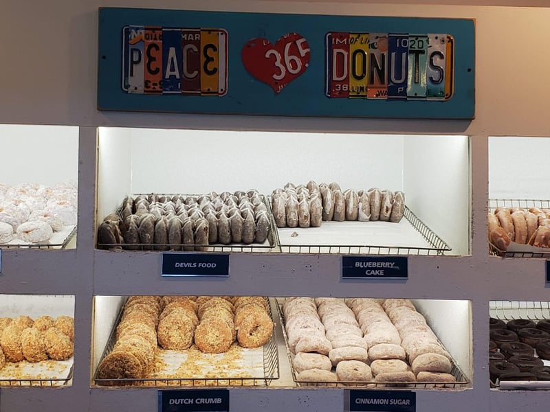 The display case with fresh donuts from the Donut Hole