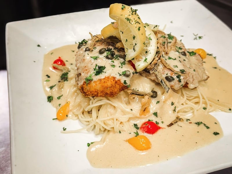 Parmesean grouper over angel hair pasta