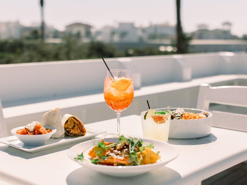 Entrees and a cocktail from Georges at Alys Beach in Florida