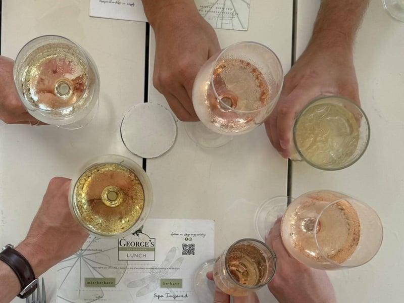 Overhead view of cocktails and wine at Georges at Alys Beach in Florida