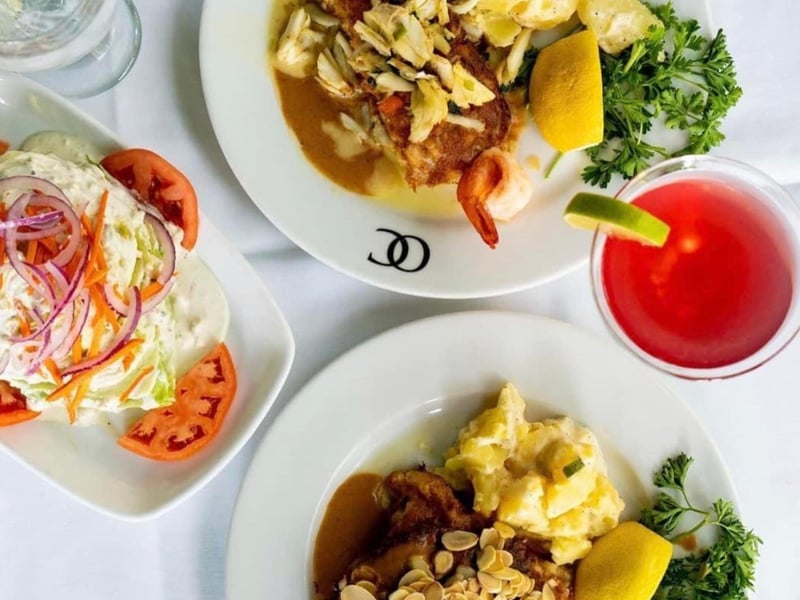 A meal spread at Ocean Club Restaurant in Miramar Beach, Florida